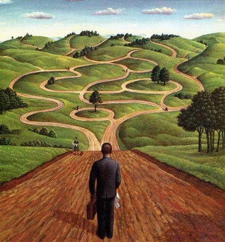 man in suit standing on winding road surrounded by green hills choice of paths leading to different directions